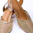 Elegant gold women’s heels with crystal straps and premium cushioned sole.