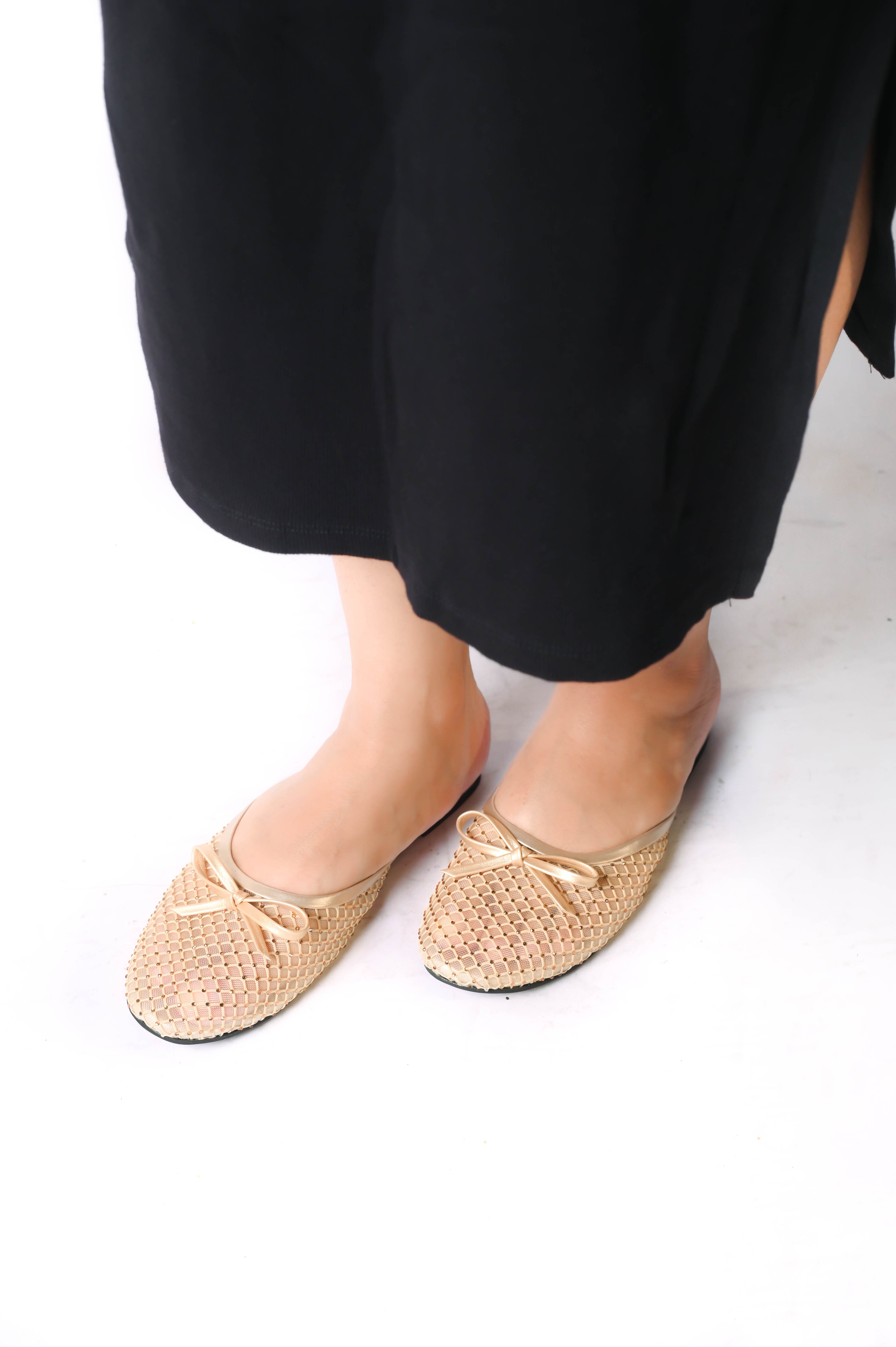 Lunara Gold women’s flat shoes with open design, cushioned insole, and stylish gold finish.