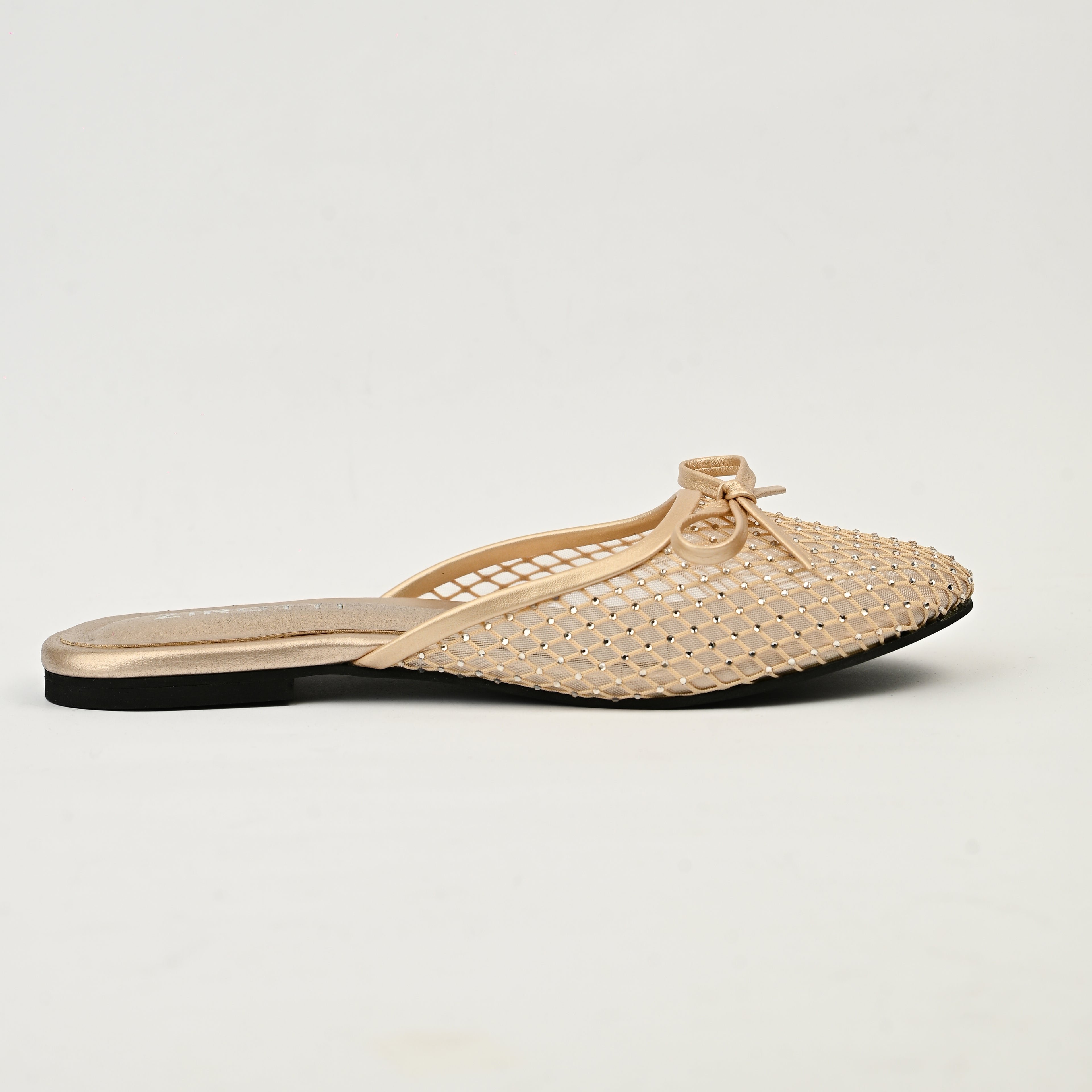 Lunara Gold women’s flat shoes with open design, cushioned insole, and stylish gold finish.