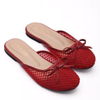 Red women’s pumps with premium mesh design and stud detailing from Zirotti.