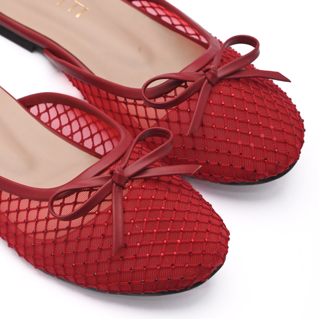 Red women’s pumps with premium mesh design and stud detailing from Zirotti.