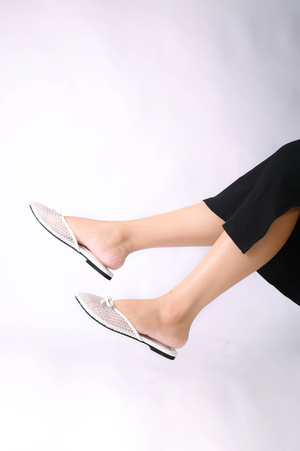 Lunara White women's pump – breathable mesh design, cushioned insole, and non-slip sole.
