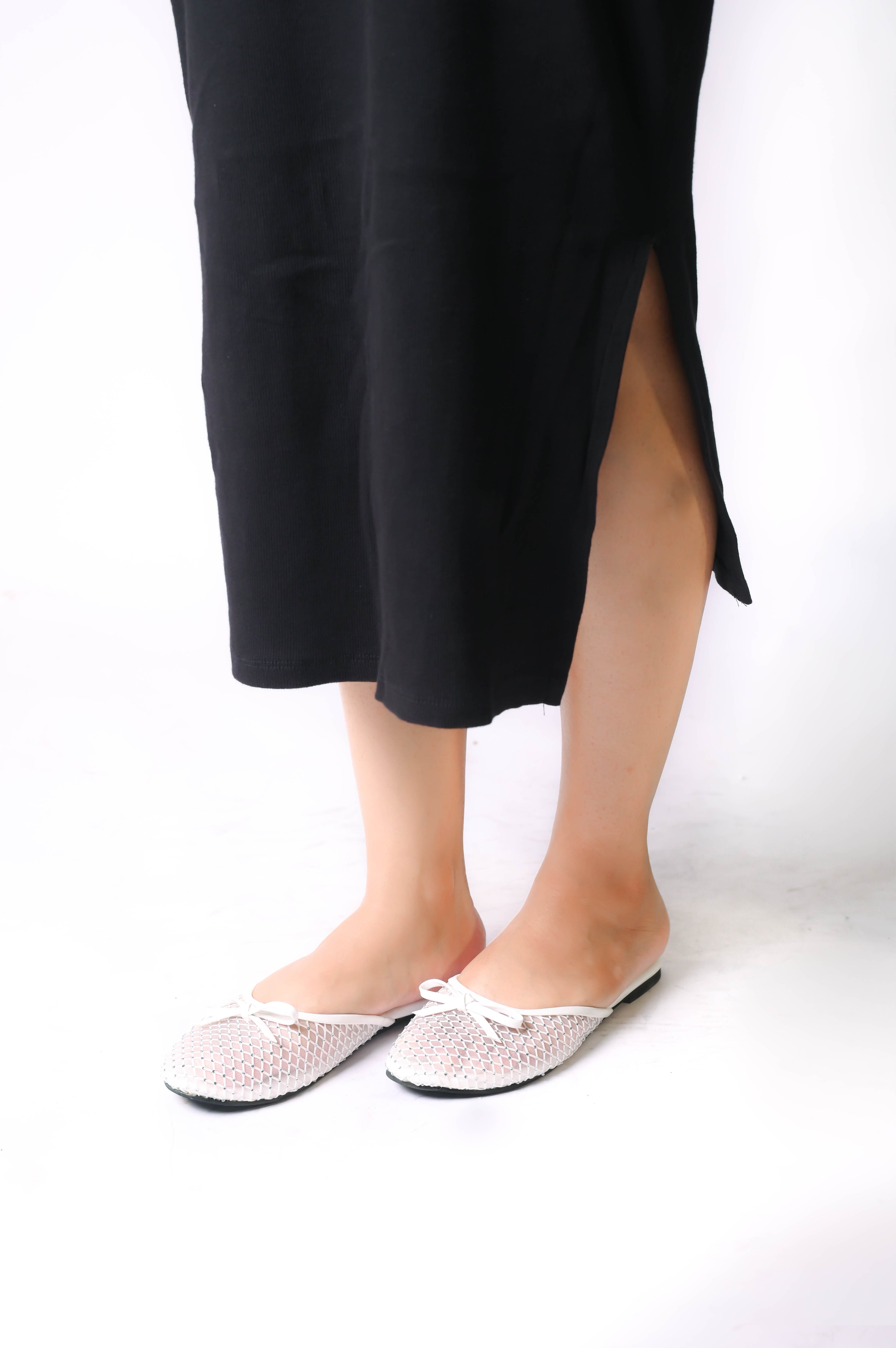 Lunara White women's pump – breathable mesh design, cushioned insole, and non-slip sole.