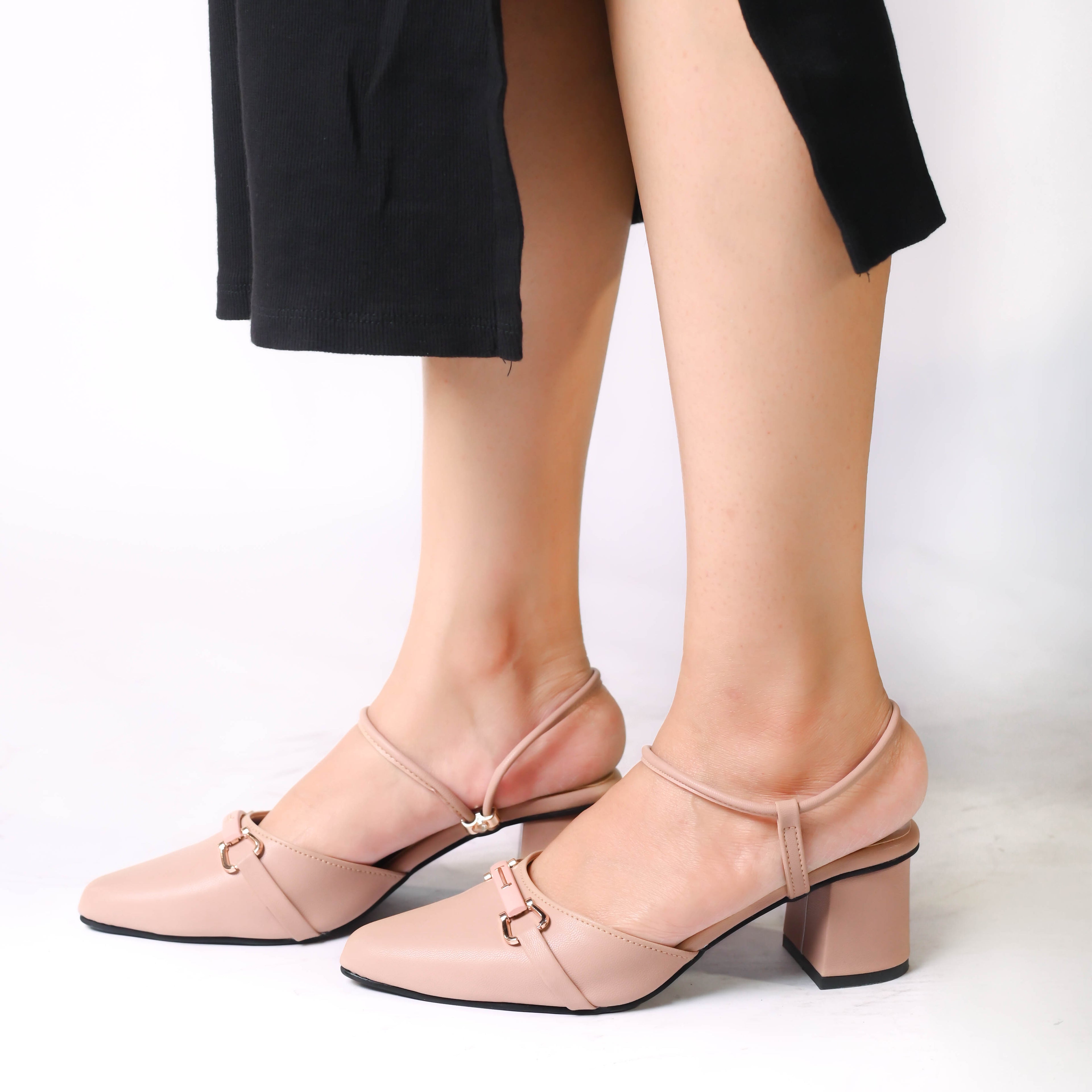 Women's stylish heels with elegant straps, perfect for casual and formal occasions.