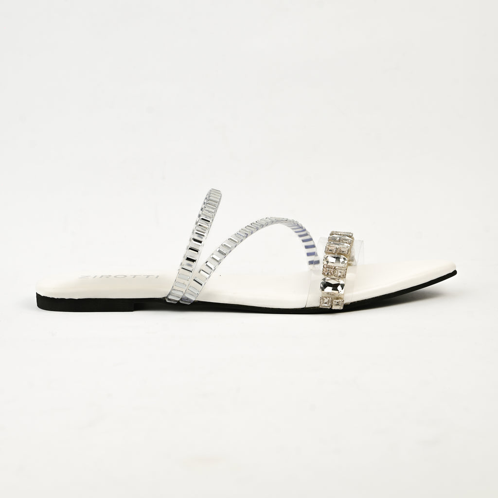 Orvia White women’s flat shoes with stylish stone detailing and comfortable sole.