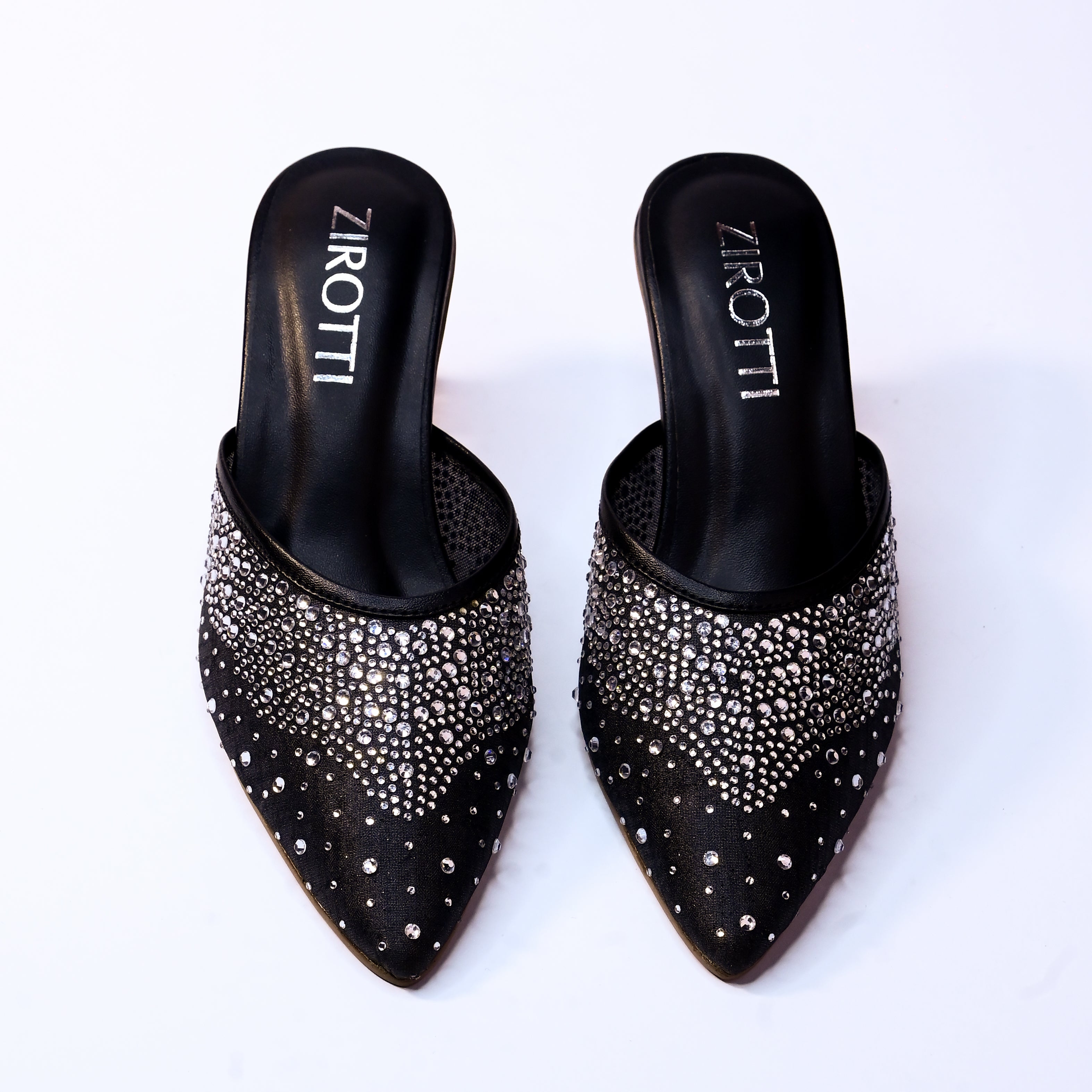 Solin Black women’s heel -black strappy high heel sandal with sparkle top and cushioned insole.