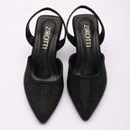 Vyana Black Heel – elegant black sandal featuring a sleek heel, glossy finish, and refined feminine silhouette, designed for formal events and evening wear.