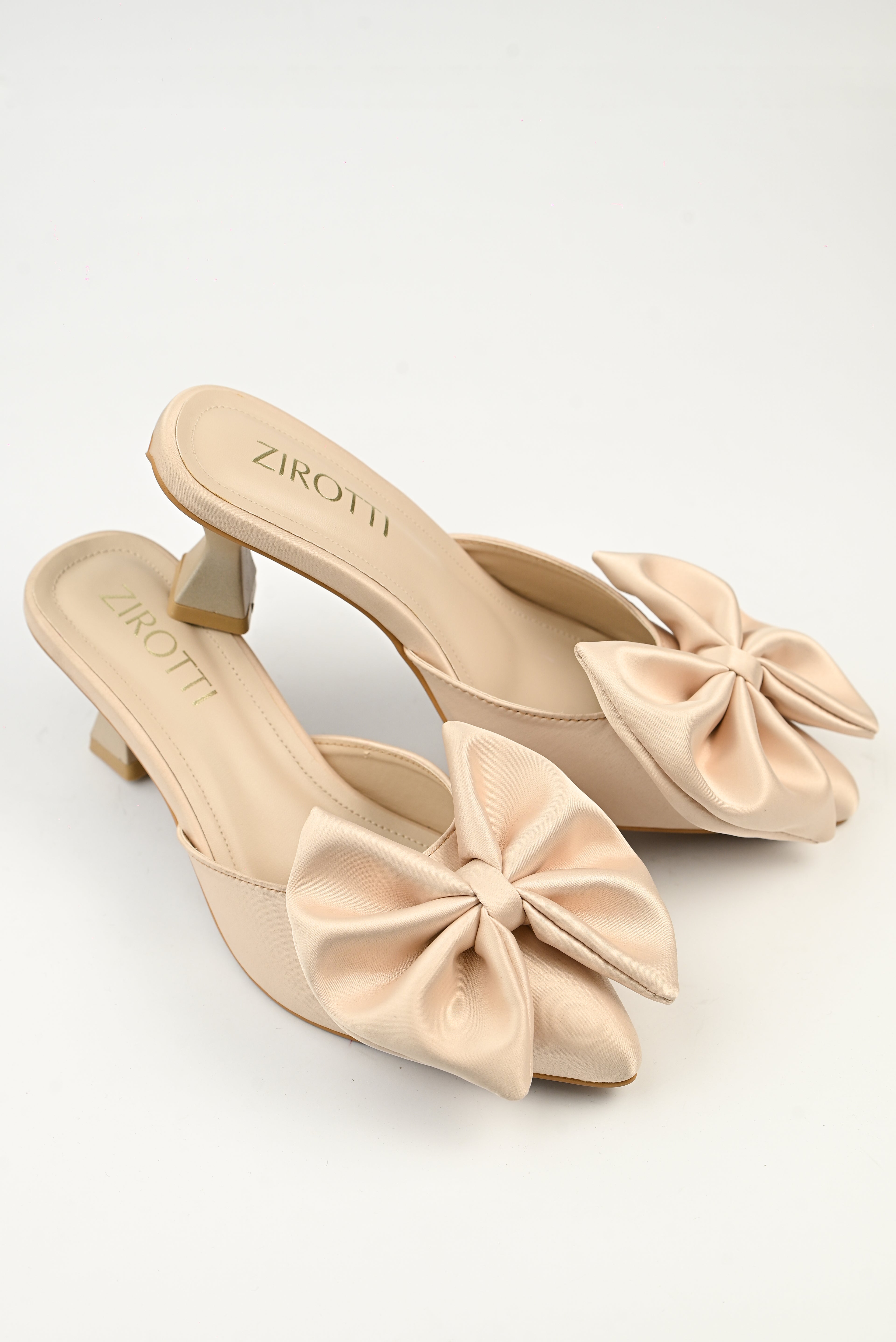 Women’s luxury fawn bow mule heels with soft cushioned insole, lightweight breathable design, and anti-slip sole.